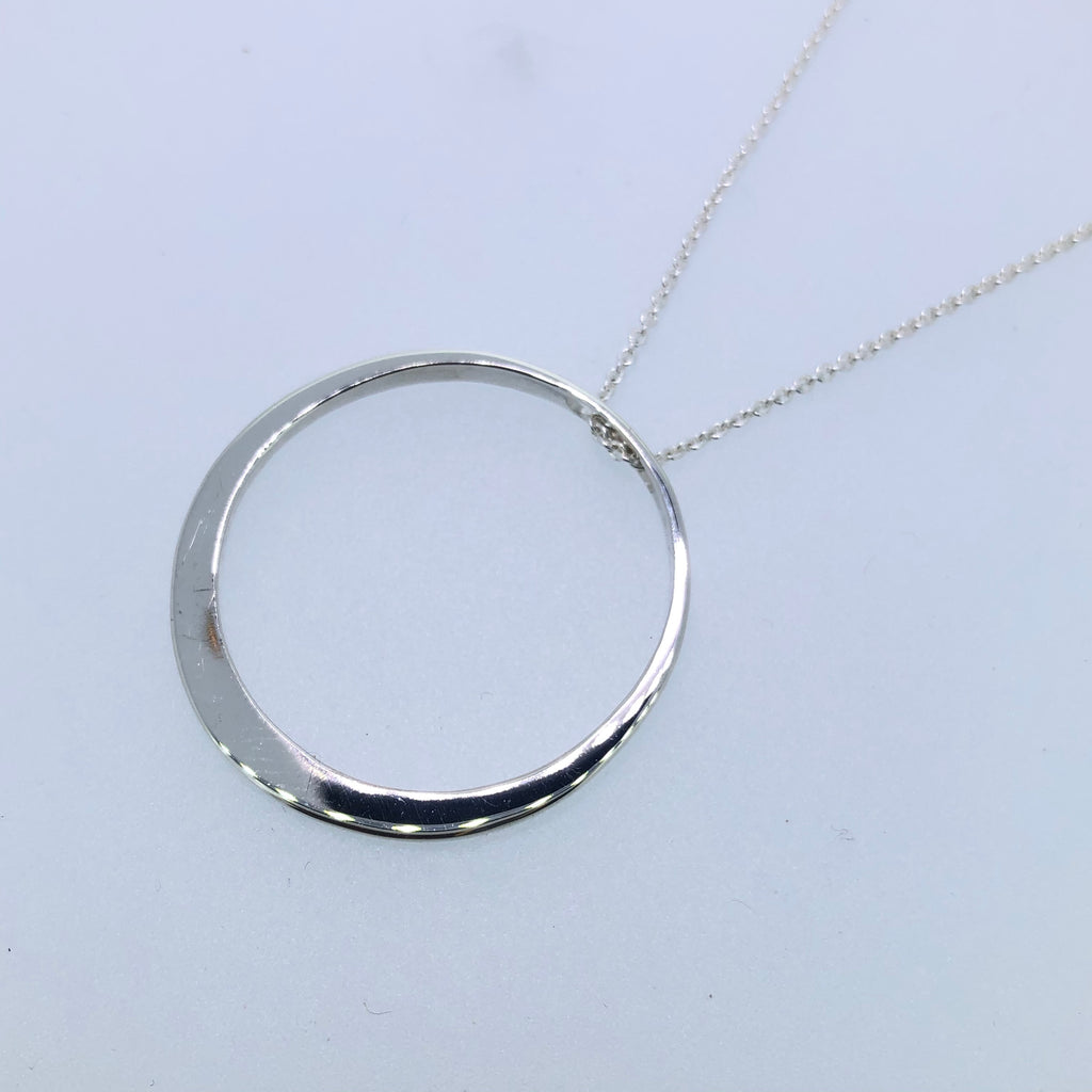 Large single circle pendant with high polish finish